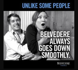 Belvedere Vodka ad shows a laughing man restraining an alarmed woman with the caption "Unlike some people Belvedere always goes down smoothly."